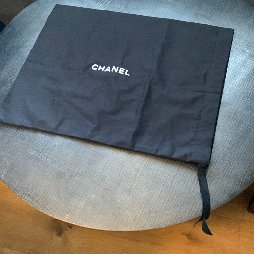 Brand new large authentic Chanel dust bag with string,never been used.Rare size!